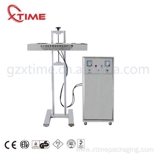 Plastic bottle cap aluminum foil sealing machine